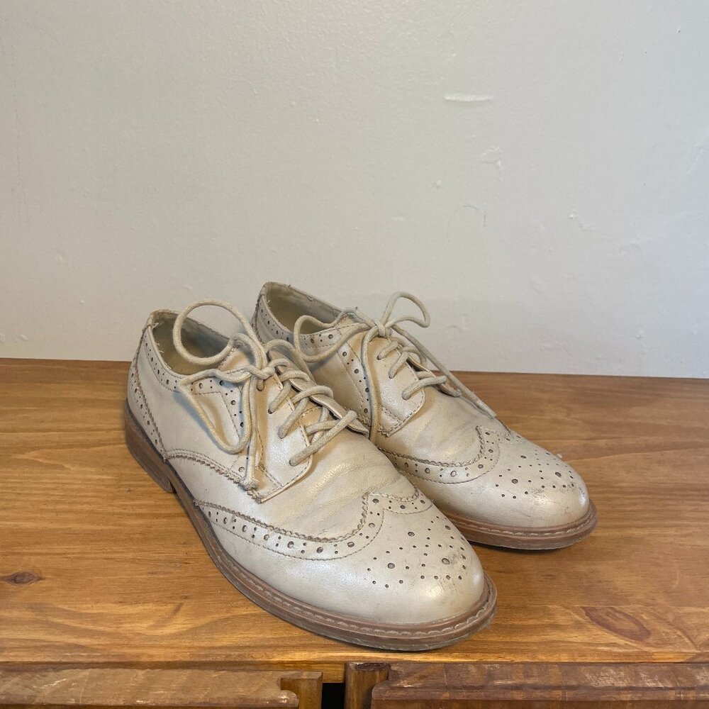 Vintage beige wingtip shoes